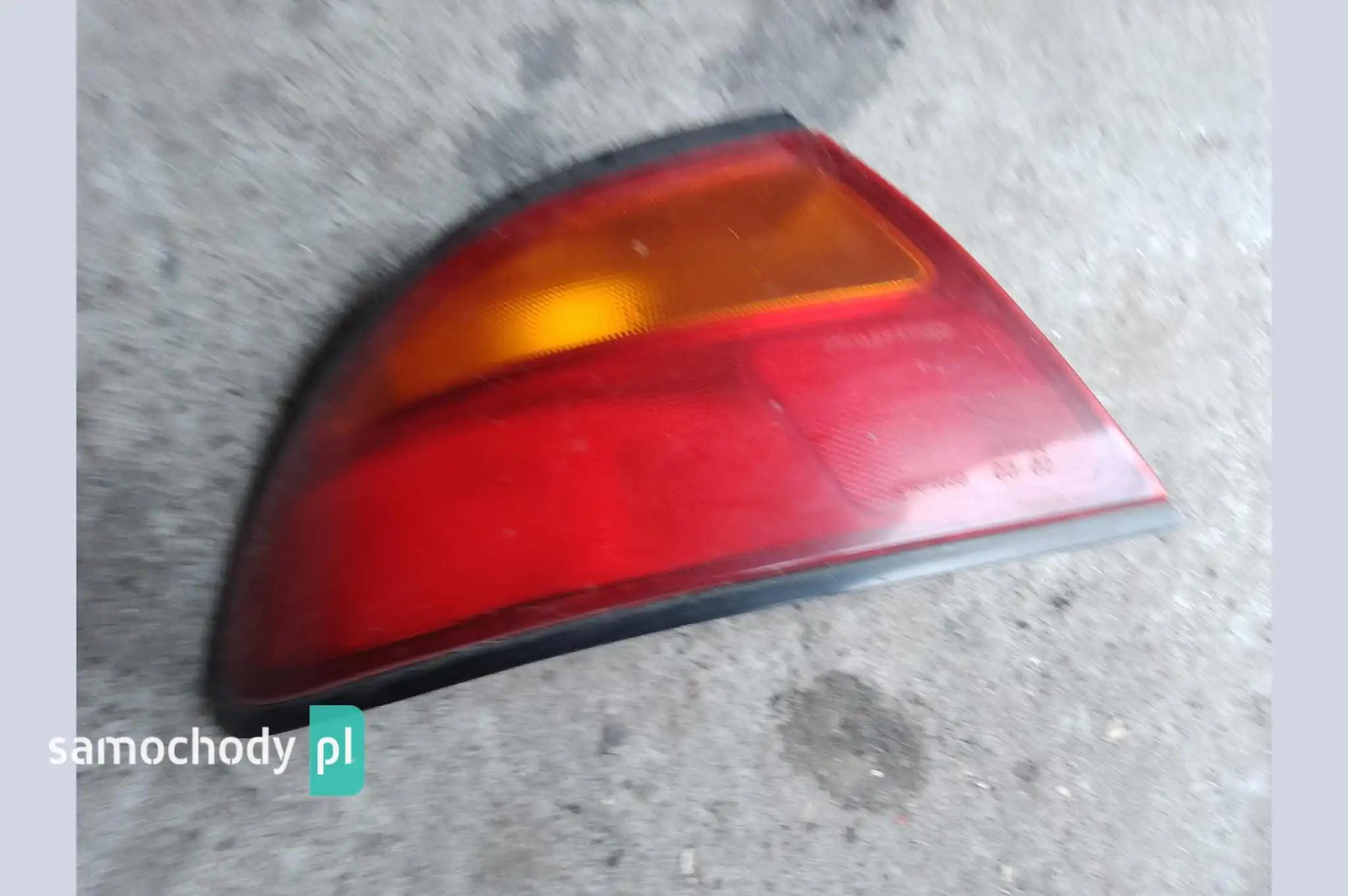 Lampa lewa tył tylna Mazda 323F F BA