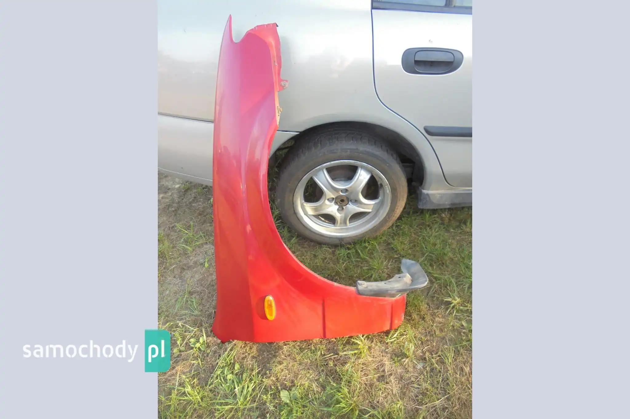 Błotnik prawy przód przedni Mazda 323F BJ lift