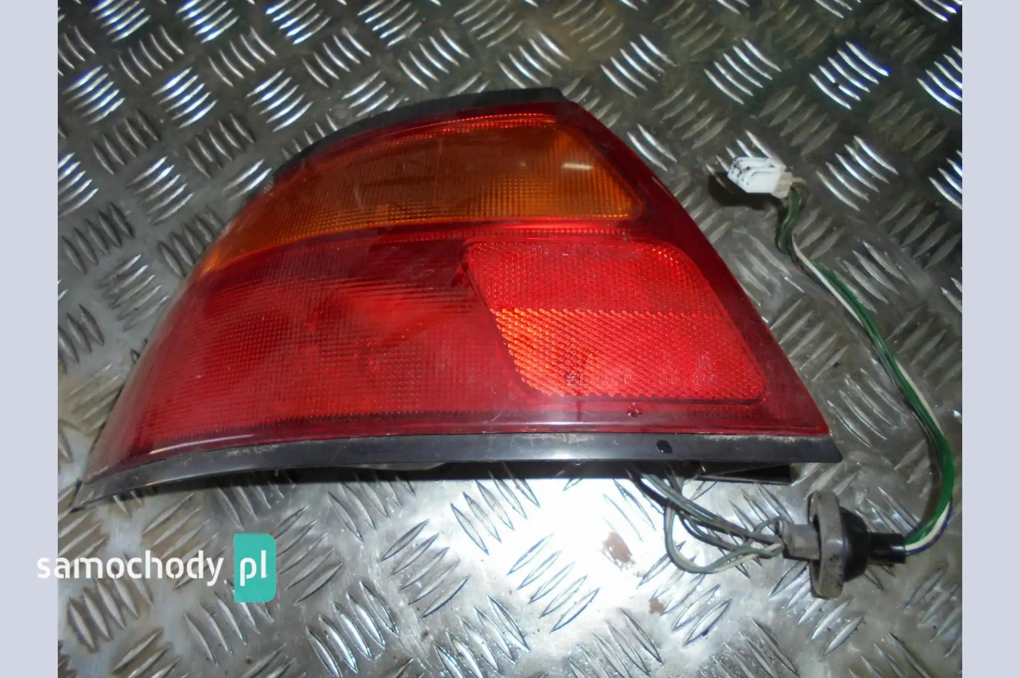 Lampa tył lewa tylna Mazda 323F BA 94-98