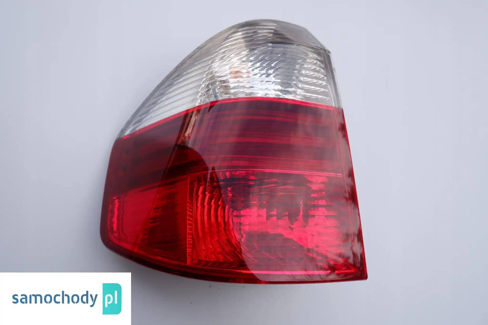 BMW E83 X3 LAMPA LEWY TYŁ LIFT 7162209