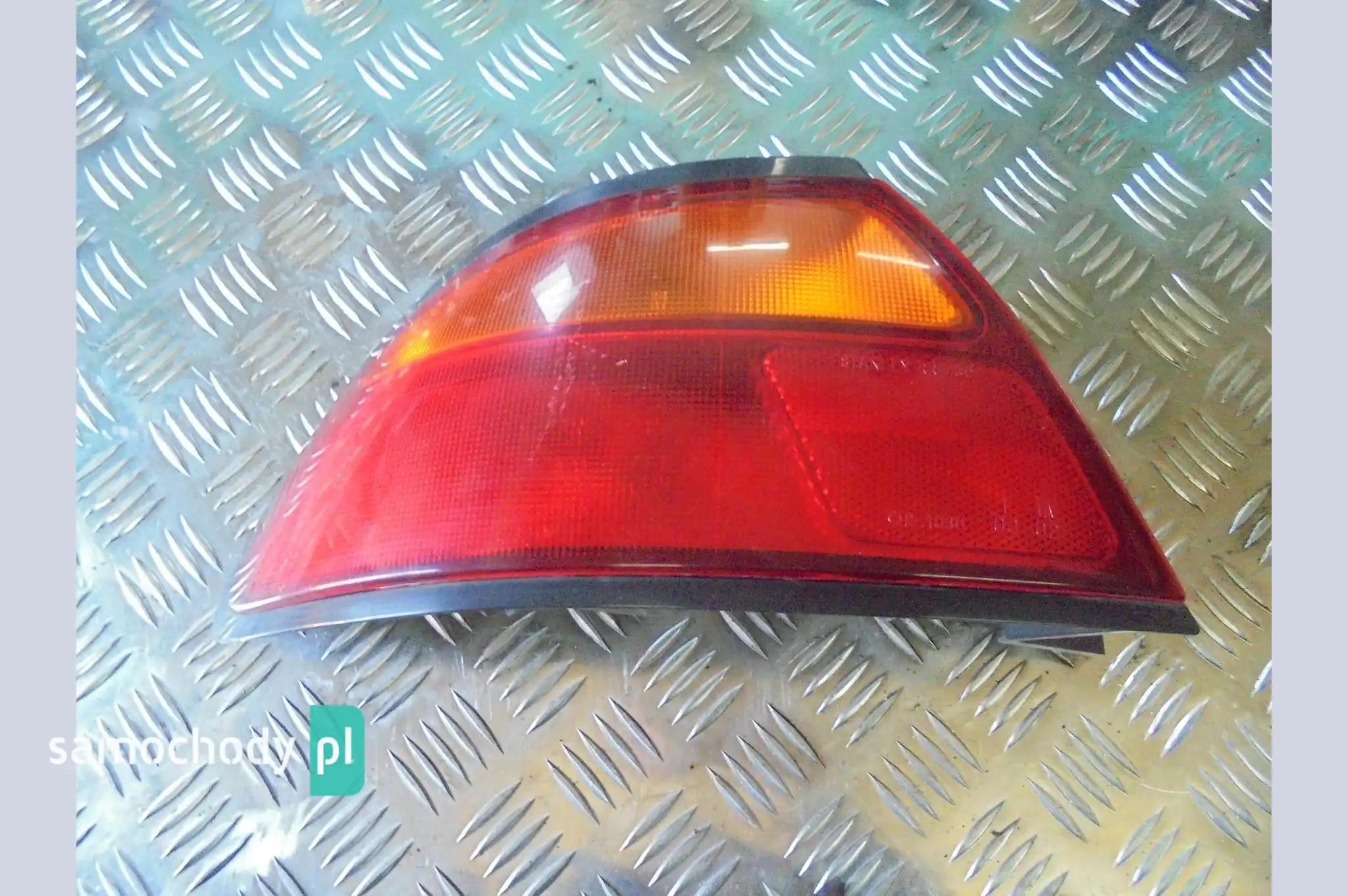 Lampa tył lewa tylna Mazda 323F F BA