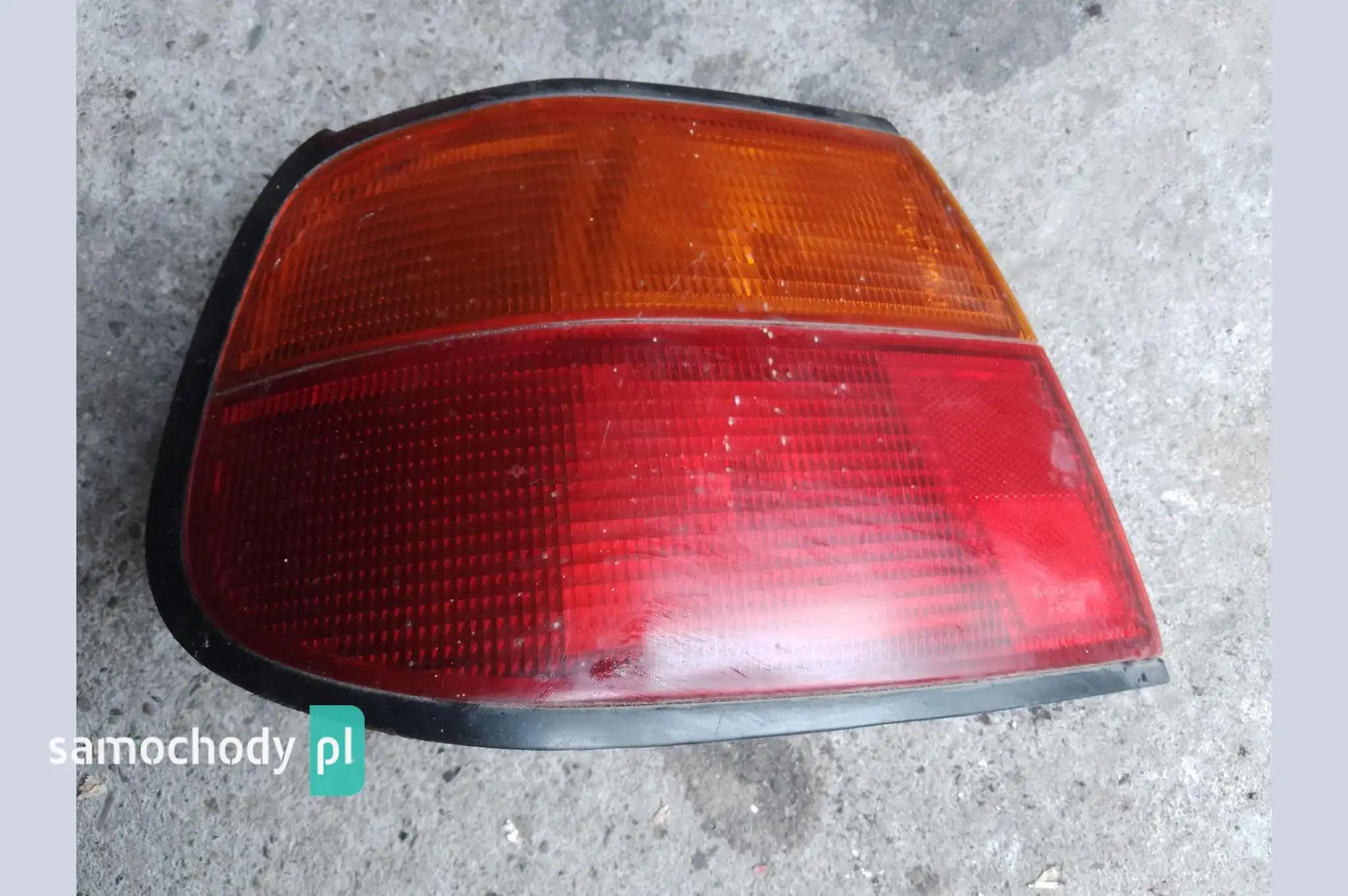 Lampa lewa tył tylna Nissan Almera N15 sedan