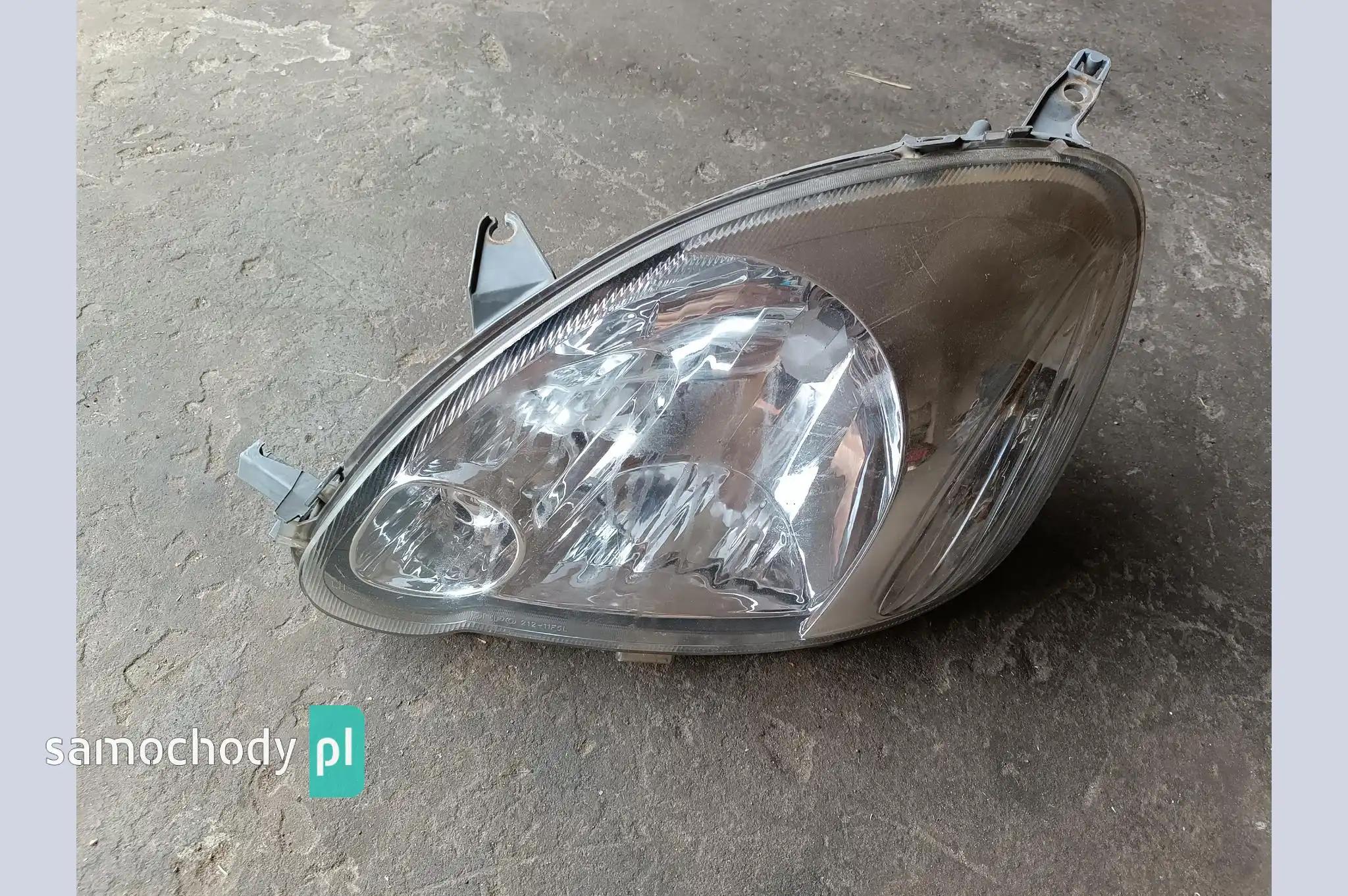 Lampa przednia lewa przód Toyota Yaris I lift