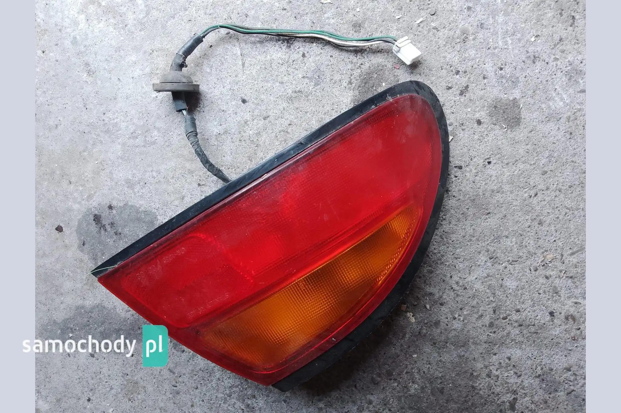 Lampa lewa tył tylna Mazda 323F F BA