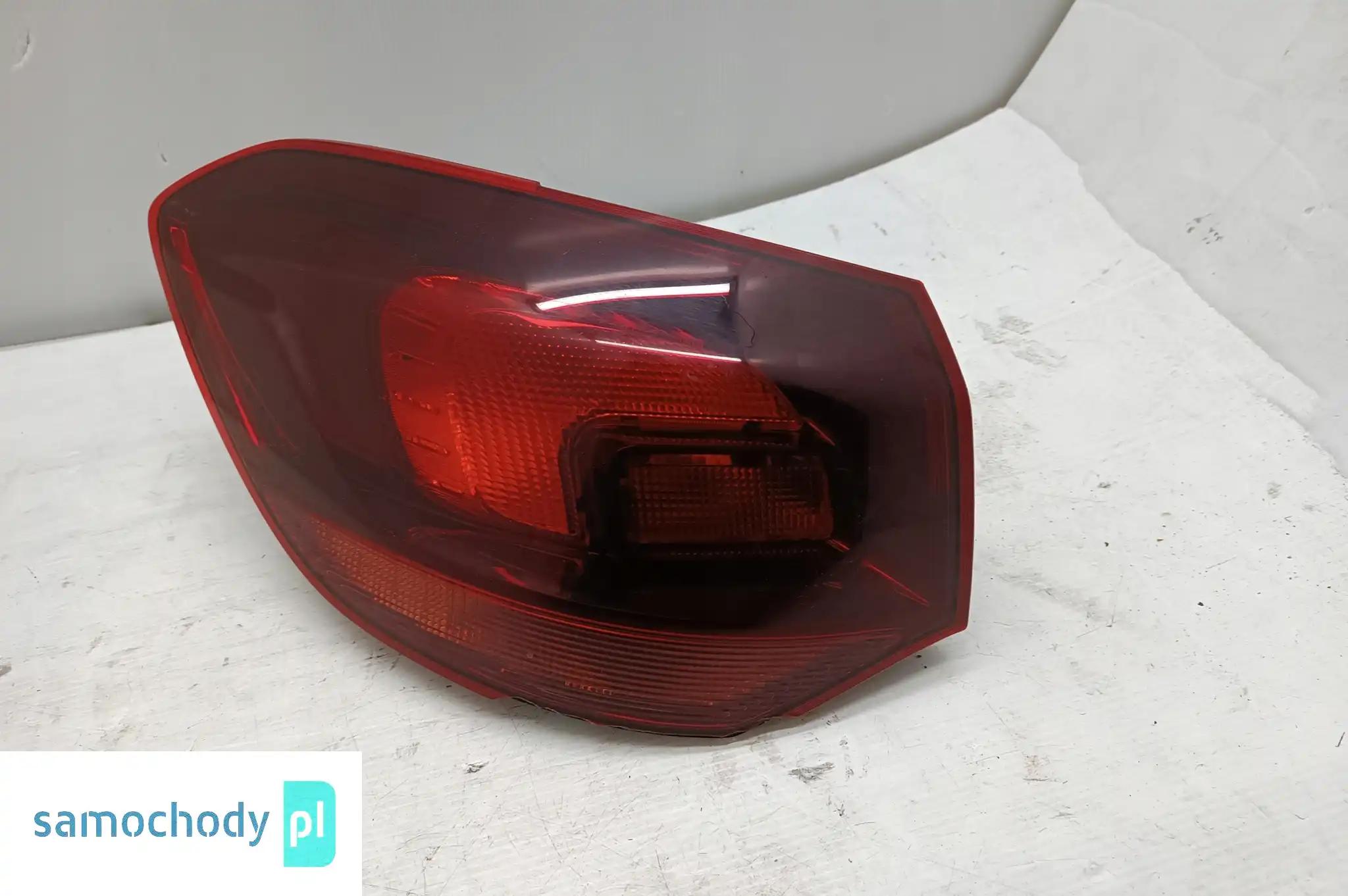 OPEL ASTRA J IV KOMBI CIEMNA 09-15 LAMPA TYŁ LEWA