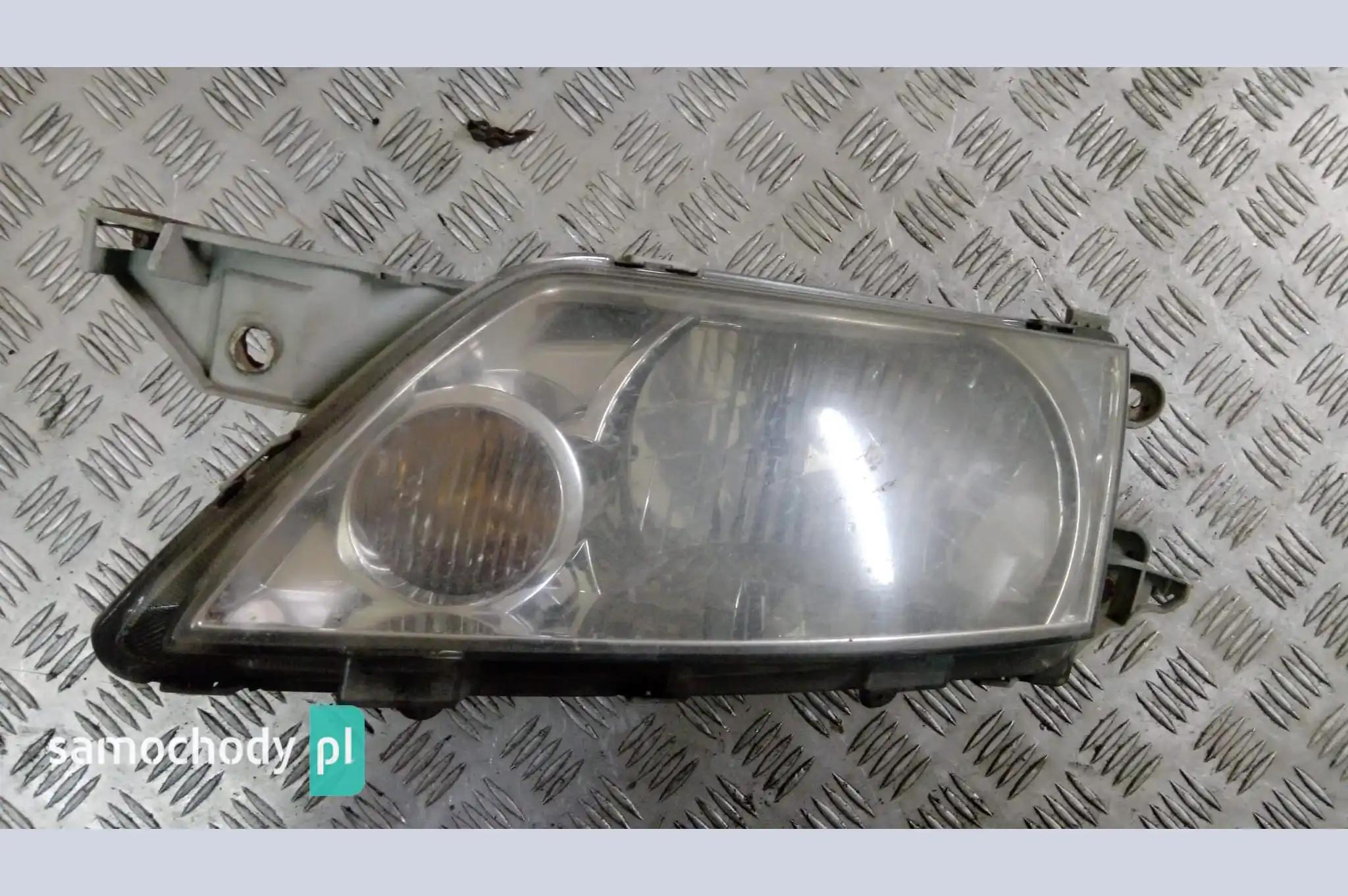 Lampa przednia lewa przód Mazda Premacy I